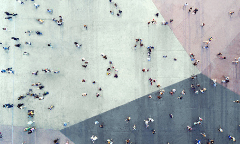 Crowd of tenants and service users from above next to a house 